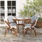 Merrick Lane Mael Bistro Style Table with Glass Top, Textilene, 4 Stack Chairs, and Bamboo Finished Metal Frame for Indoor/Outdoor Use
